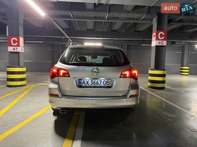 Серый Опель Астра, объемом двигателя 1.4 л и пробегом 243 тыс. км за 7800 $, фото 5 на Automoto.ua