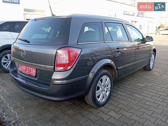 Серый Опель Астра, объемом двигателя 1.8 л и пробегом 253 тыс. км за 6599 $, фото 11 на Automoto.ua