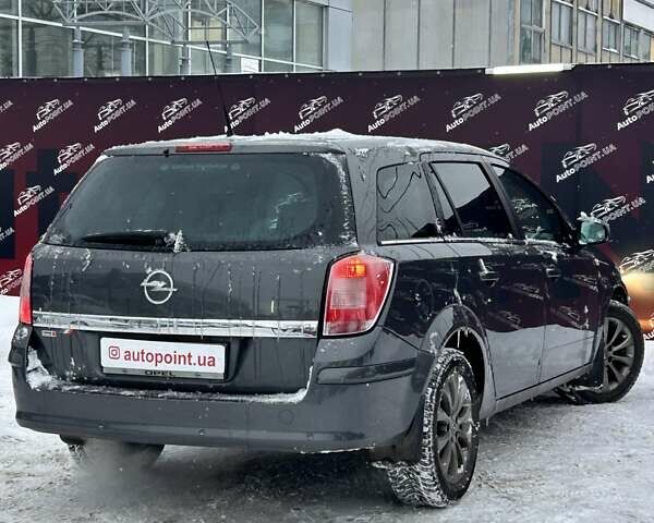 Серый Опель Астра, объемом двигателя 1.8 л и пробегом 204 тыс. км за 6500 $, фото 6 на Automoto.ua