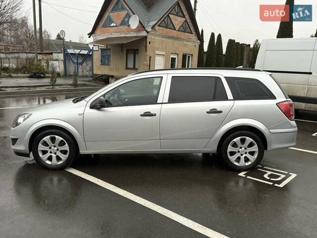 Серый Опель Астра, объемом двигателя 1.6 л и пробегом 231 тыс. км за 5699 $, фото 7 на Automoto.ua