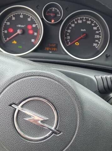 Серый Опель Астра, объемом двигателя 1.6 л и пробегом 263 тыс. км за 5800 $, фото 1 на Automoto.ua