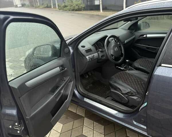 Серый Опель Астра, объемом двигателя 1.6 л и пробегом 175 тыс. км за 5650 $, фото 24 на Automoto.ua