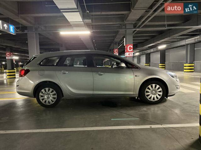 Серый Опель Астра, объемом двигателя 1.4 л и пробегом 243 тыс. км за 7800 $, фото 7 на Automoto.ua