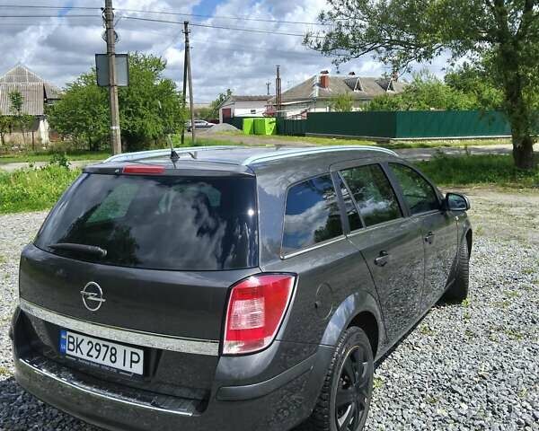 Серый Опель Астра, объемом двигателя 1.6 л и пробегом 248 тыс. км за 5800 $, фото 67 на Automoto.ua