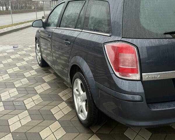 Серый Опель Астра, объемом двигателя 1.6 л и пробегом 175 тыс. км за 5650 $, фото 15 на Automoto.ua