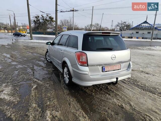 Серый Опель Астра, объемом двигателя 1.6 л и пробегом 189 тыс. км за 5600 $, фото 11 на Automoto.ua