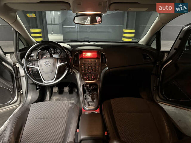 Серый Опель Астра, объемом двигателя 1.4 л и пробегом 243 тыс. км за 7800 $, фото 11 на Automoto.ua