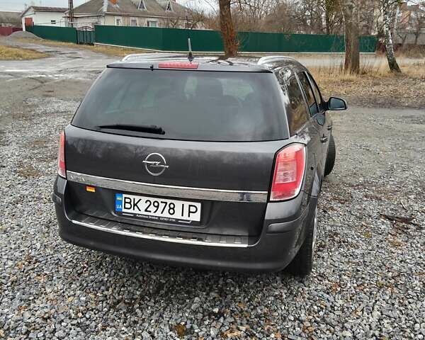 Серый Опель Астра, объемом двигателя 1.6 л и пробегом 248 тыс. км за 5800 $, фото 27 на Automoto.ua