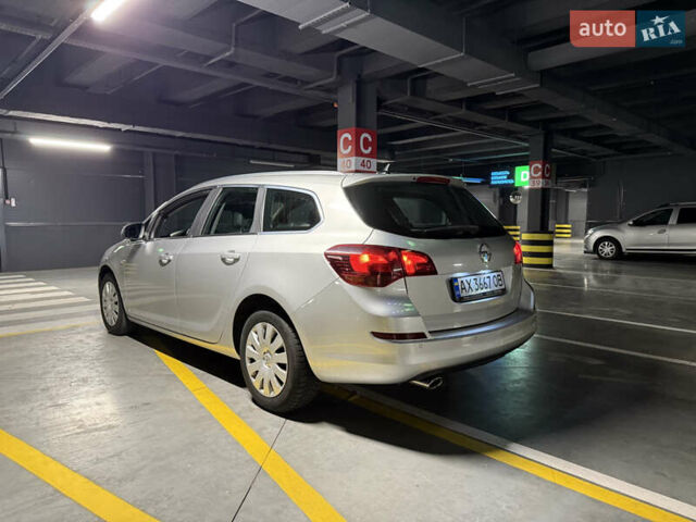 Серый Опель Астра, объемом двигателя 1.4 л и пробегом 243 тыс. км за 7800 $, фото 4 на Automoto.ua