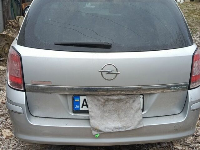 Серый Опель Астра, объемом двигателя 1.7 л и пробегом 240 тыс. км за 7000 $, фото 14 на Automoto.ua