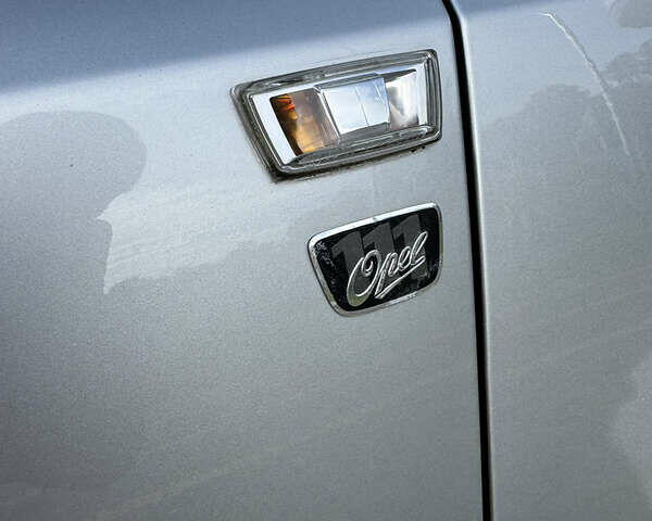 Серый Опель Астра, объемом двигателя 1.7 л и пробегом 255 тыс. км за 5800 $, фото 21 на Automoto.ua