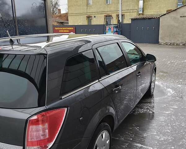 Серый Опель Астра, объемом двигателя 1.6 л и пробегом 248 тыс. км за 5800 $, фото 21 на Automoto.ua