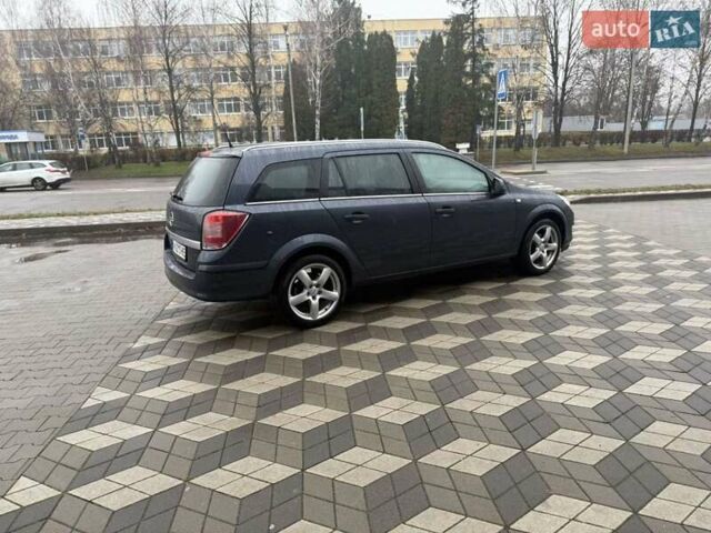 Серый Опель Астра, объемом двигателя 1.6 л и пробегом 175 тыс. км за 5650 $, фото 12 на Automoto.ua