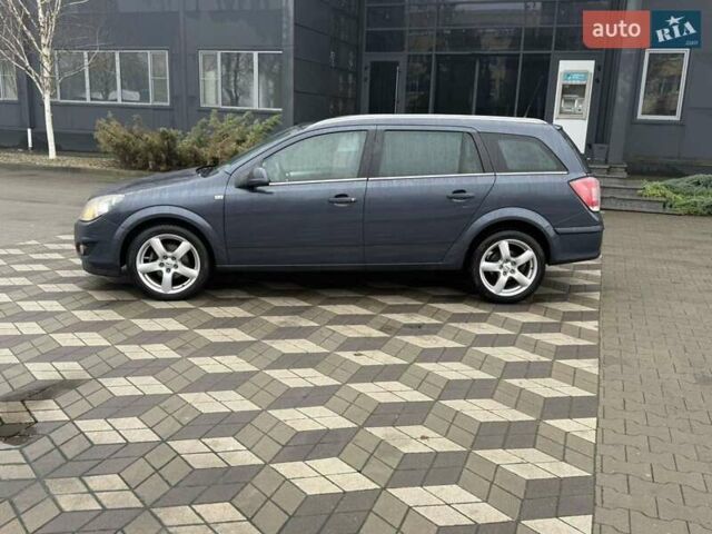 Серый Опель Астра, объемом двигателя 1.6 л и пробегом 175 тыс. км за 5650 $, фото 11 на Automoto.ua