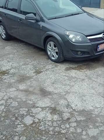 Серый Опель Астра, объемом двигателя 1.6 л и пробегом 263 тыс. км за 5800 $, фото 6 на Automoto.ua