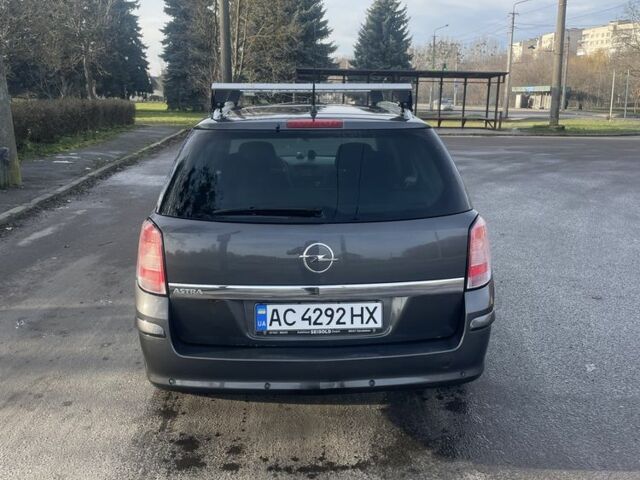 Серый Опель Астра, объемом двигателя 1.6 л и пробегом 263 тыс. км за 5700 $, фото 6 на Automoto.ua