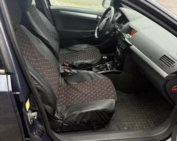 Серый Опель Астра, объемом двигателя 1.6 л и пробегом 175 тыс. км за 5650 $, фото 29 на Automoto.ua