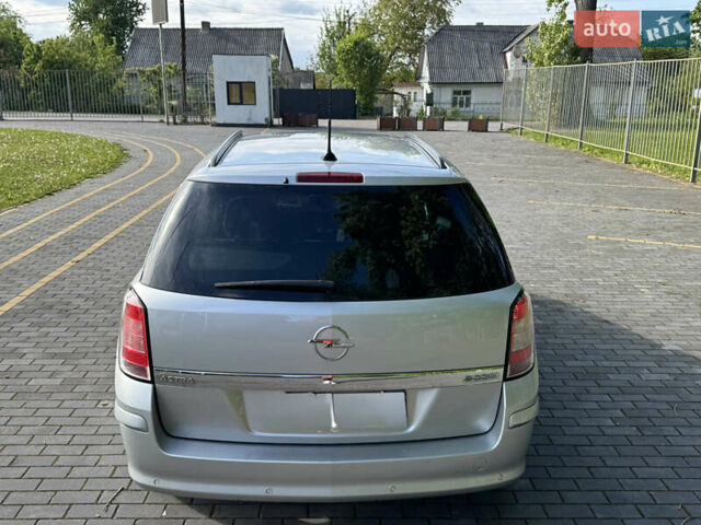 Серый Опель Астра, объемом двигателя 1.7 л и пробегом 255 тыс. км за 5800 $, фото 15 на Automoto.ua