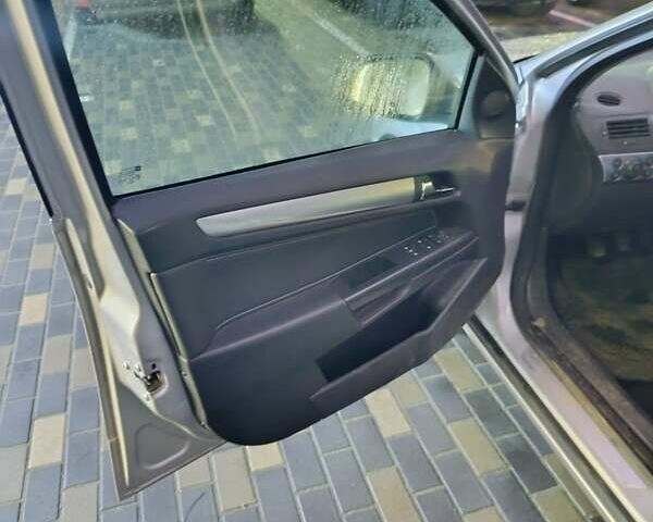 Серый Опель Астра, объемом двигателя 1.7 л и пробегом 238 тыс. км за 4999 $, фото 12 на Automoto.ua