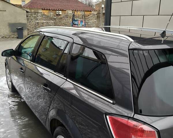 Серый Опель Астра, объемом двигателя 1.6 л и пробегом 248 тыс. км за 5800 $, фото 20 на Automoto.ua