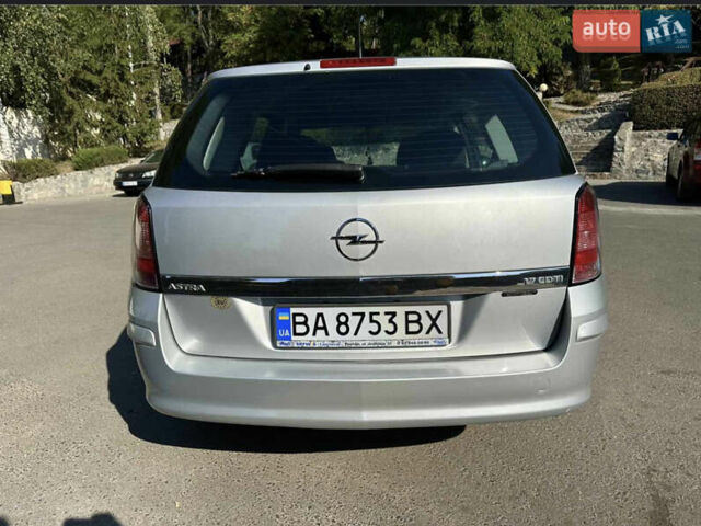 Серый Опель Астра, объемом двигателя 1.69 л и пробегом 217 тыс. км за 5850 $, фото 2 на Automoto.ua
