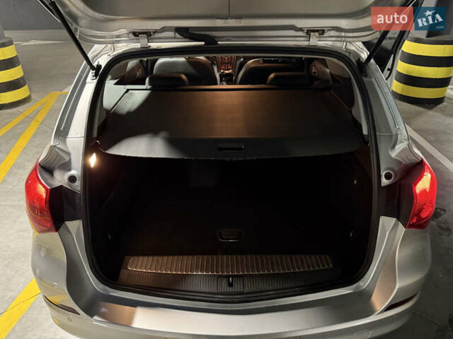 Серый Опель Астра, объемом двигателя 1.4 л и пробегом 243 тыс. км за 7800 $, фото 14 на Automoto.ua