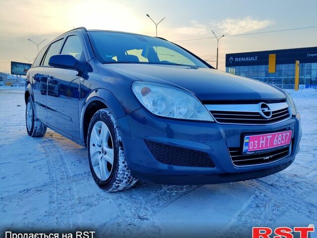 Серый Опель Астра, объемом двигателя 1.6 л и пробегом 18900 тыс. км за 4999 $, фото 2 на Automoto.ua