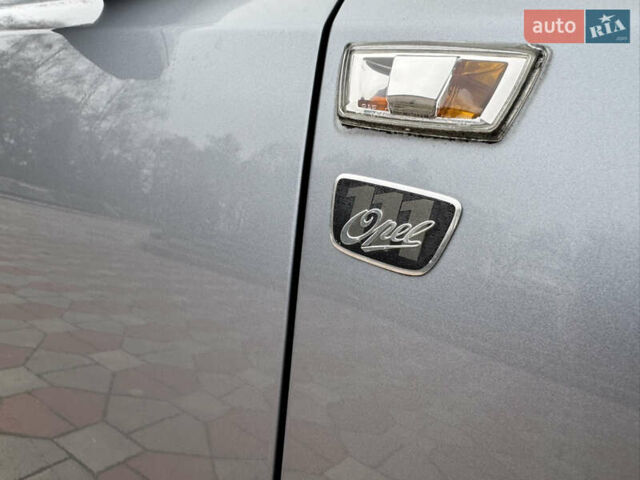 Серый Опель Астра, объемом двигателя 1.6 л и пробегом 209 тыс. км за 6400 $, фото 12 на Automoto.ua
