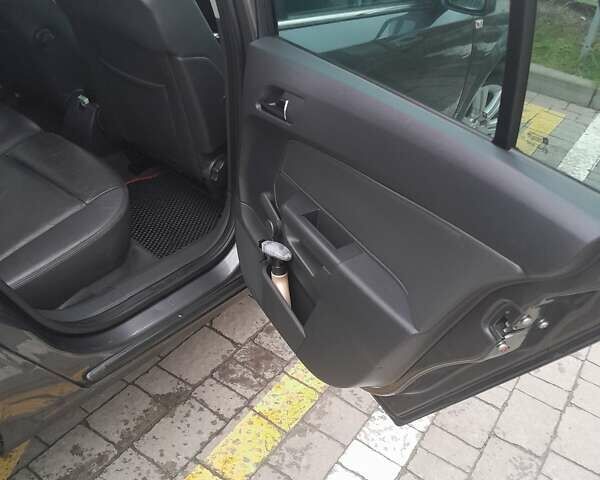 Сірий Опель Астра, об'ємом двигуна 1.8 л та пробігом 223 тис. км за 6399 $, фото 4 на Automoto.ua