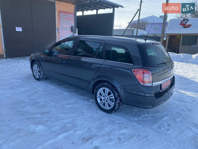 Серый Опель Астра, объемом двигателя 1.6 л и пробегом 232 тыс. км за 5600 $, фото 3 на Automoto.ua