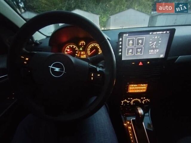 Серый Опель Астра, объемом двигателя 1.8 л и пробегом 220 тыс. км за 7000 $, фото 11 на Automoto.ua