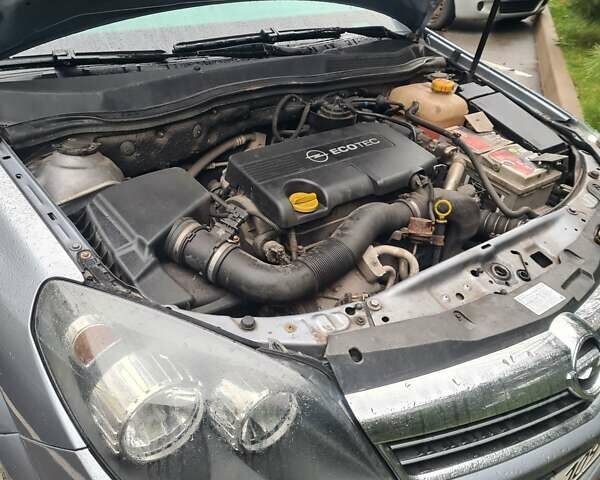 Сірий Опель Астра, об'ємом двигуна 1.69 л та пробігом 374 тис. км за 5500 $, фото 9 на Automoto.ua