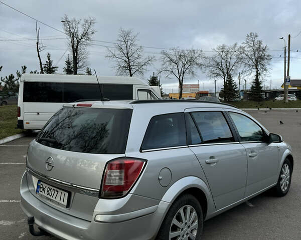 Серый Опель Астра, объемом двигателя 1.69 л и пробегом 320 тыс. км за 5800 $, фото 5 на Automoto.ua