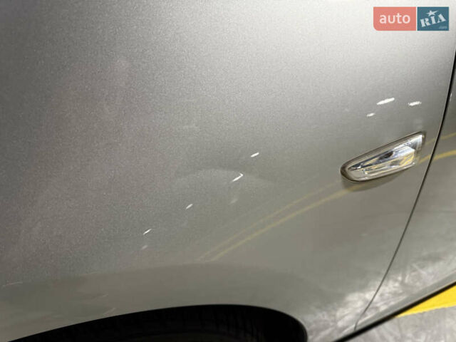 Серый Опель Астра, объемом двигателя 1.4 л и пробегом 243 тыс. км за 7800 $, фото 17 на Automoto.ua