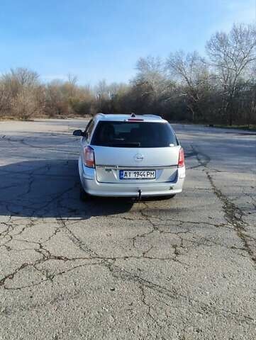 Серый Опель Астра, объемом двигателя 1.6 л и пробегом 260 тыс. км за 5000 $, фото 8 на Automoto.ua