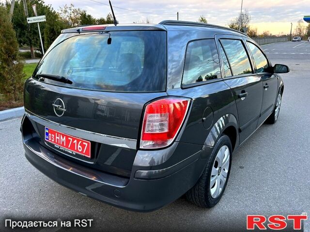 Серый Опель Астра, объемом двигателя 1.6 л и пробегом 143 тыс. км за 6500 $, фото 4 на Automoto.ua