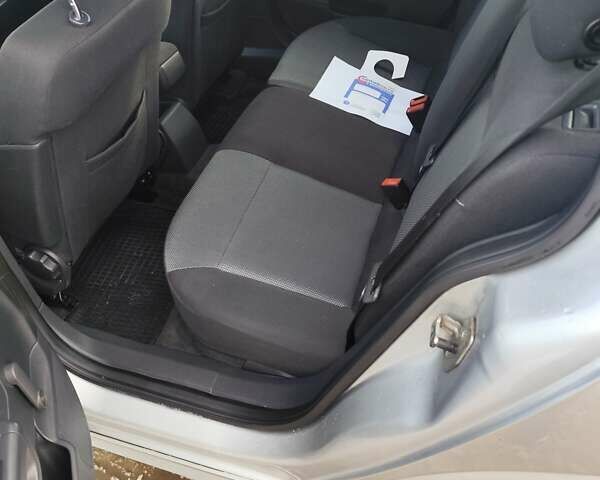 Серый Опель Астра, объемом двигателя 1.6 л и пробегом 189 тыс. км за 5600 $, фото 17 на Automoto.ua