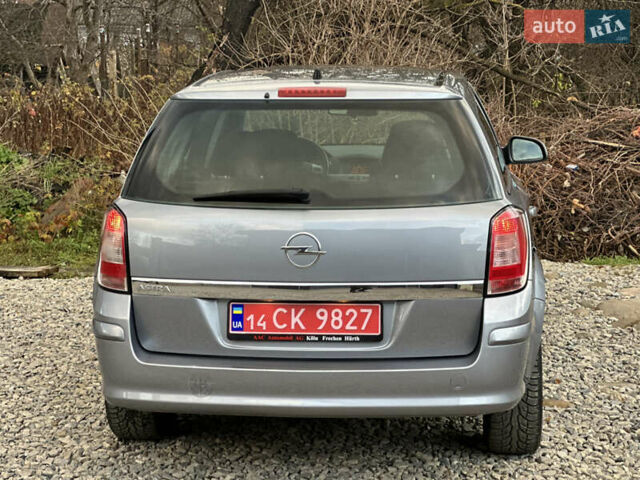 Серый Опель Астра, объемом двигателя 1.6 л и пробегом 224 тыс. км за 5500 $, фото 22 на Automoto.ua