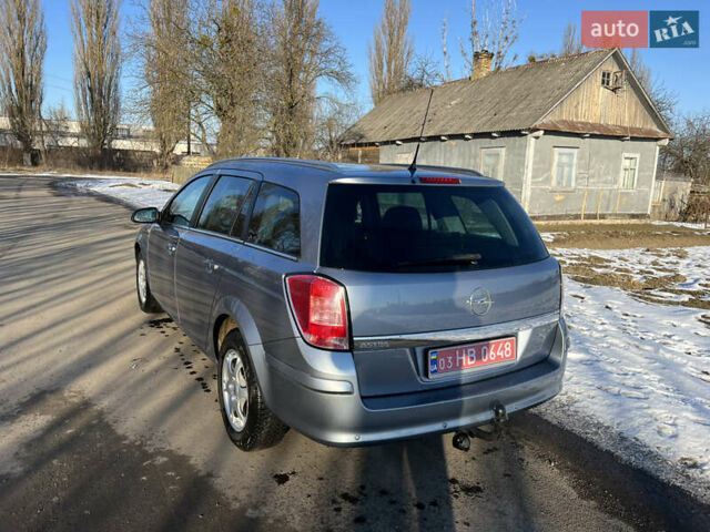 Серый Опель Астра, объемом двигателя 1.6 л и пробегом 243 тыс. км за 5500 $, фото 6 на Automoto.ua