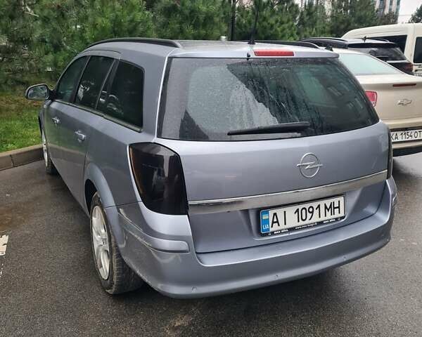 Сірий Опель Астра, об'ємом двигуна 1.69 л та пробігом 374 тис. км за 5500 $, фото 4 на Automoto.ua