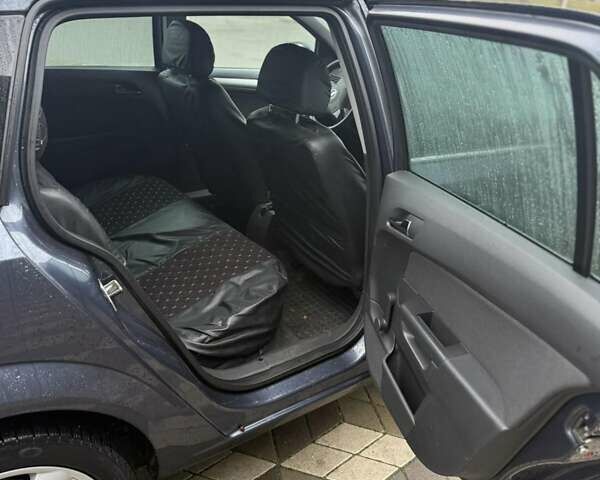 Серый Опель Астра, объемом двигателя 1.6 л и пробегом 175 тыс. км за 5650 $, фото 26 на Automoto.ua