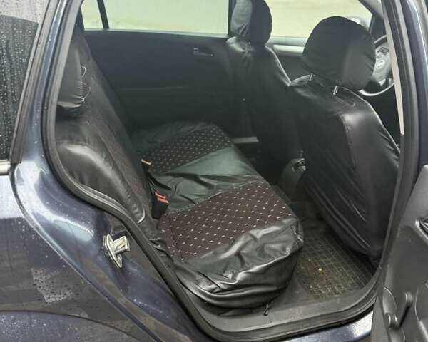 Серый Опель Астра, объемом двигателя 1.6 л и пробегом 175 тыс. км за 5650 $, фото 25 на Automoto.ua