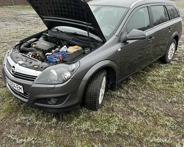 Серый Опель Астра, объемом двигателя 1.69 л и пробегом 336 тыс. км за 6600 $, фото 6 на Automoto.ua