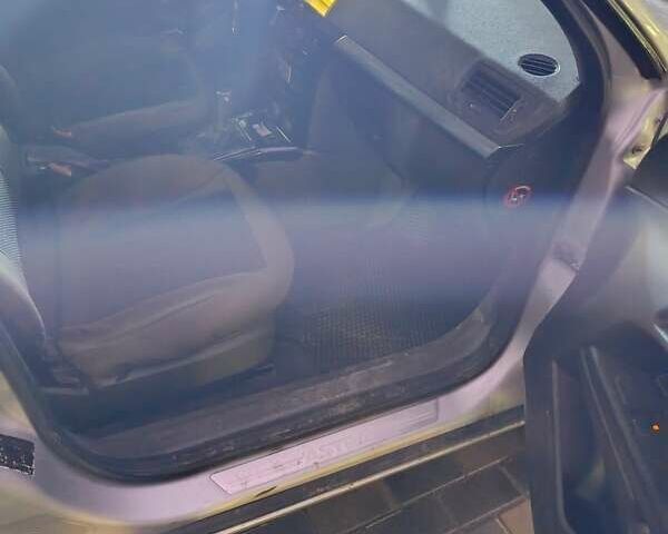 Серый Опель Астра, объемом двигателя 1.7 л и пробегом 238 тыс. км за 4999 $, фото 26 на Automoto.ua