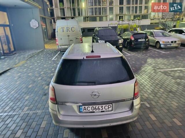 Серый Опель Астра, объемом двигателя 1.7 л и пробегом 238 тыс. км за 4999 $, фото 7 на Automoto.ua