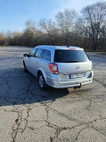 Серый Опель Астра, объемом двигателя 1.6 л и пробегом 260 тыс. км за 5000 $, фото 7 на Automoto.ua