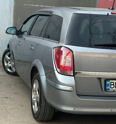 Серый Опель Астра, объемом двигателя 1.69 л и пробегом 250 тыс. км за 5999 $, фото 13 на Automoto.ua
