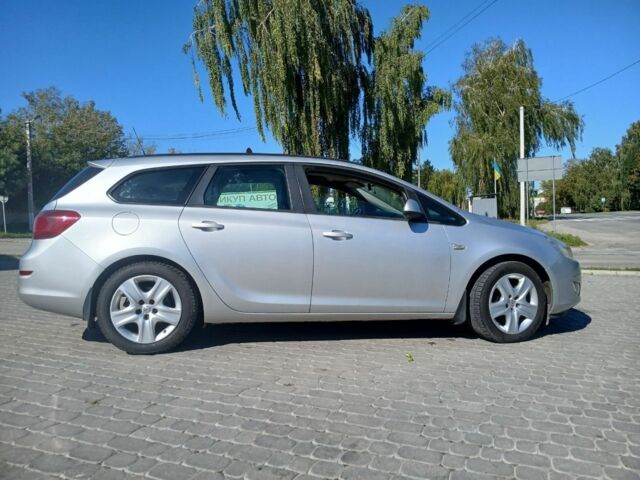 Серый Опель Астра, объемом двигателя 1.7 л и пробегом 282 тыс. км за 7200 $, фото 7 на Automoto.ua