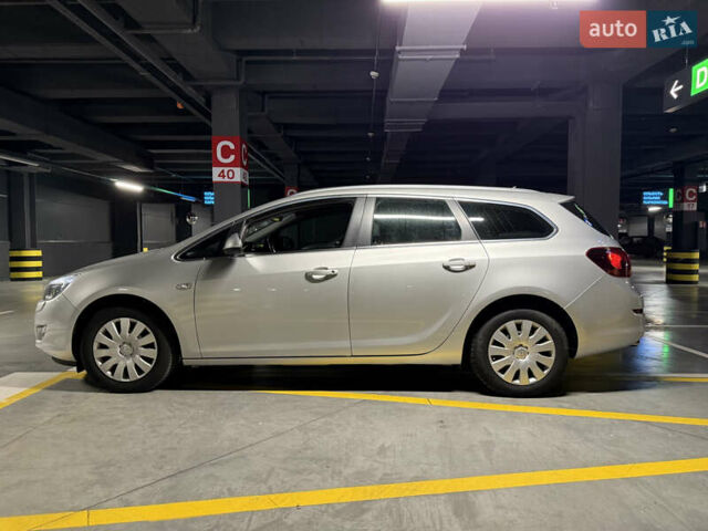 Серый Опель Астра, объемом двигателя 1.4 л и пробегом 243 тыс. км за 7800 $, фото 3 на Automoto.ua