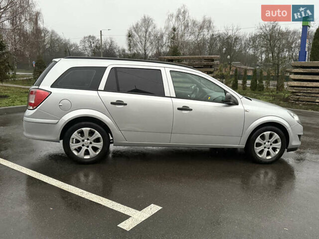 Серый Опель Астра, объемом двигателя 1.6 л и пробегом 231 тыс. км за 5699 $, фото 19 на Automoto.ua